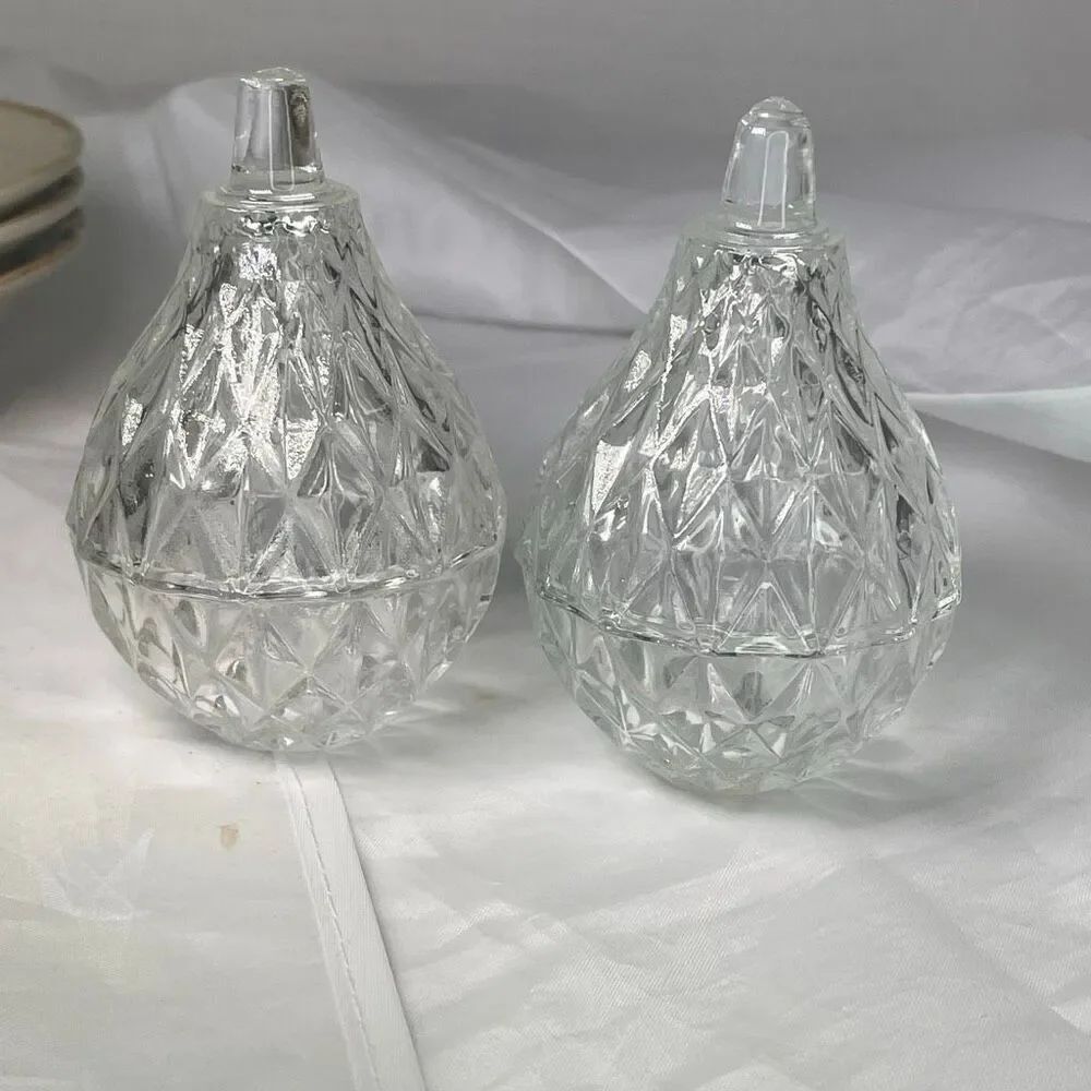 Lot of two lead crystal Romania pear shaped trinket boxes.